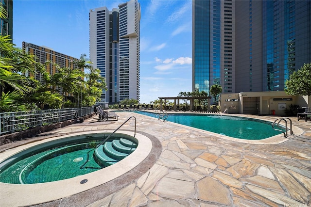 1177 Queen St Unit 4104, Honolulu, HI 96814 - community pool with a patio area and a pergola