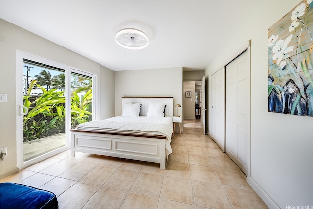 539 N Kainalu Dr, Kailua, HI 96734 - bedroom featuring access to exterior, light tile patterned floors, and a closet