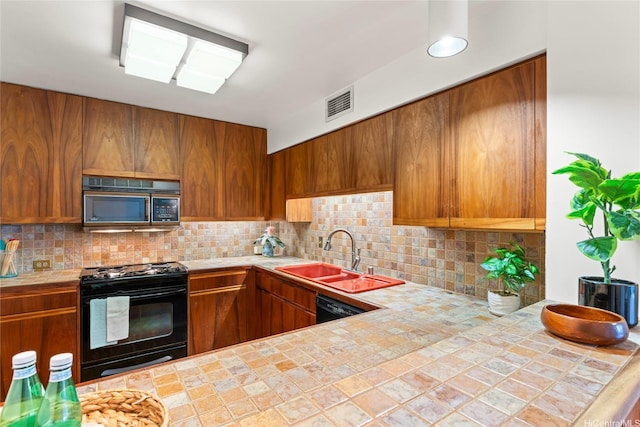1525 Wilder Ave Unit 401, Honolulu, HI 96822 - kitchen with black appliances, decorative backsplash, and brown cabinetry
