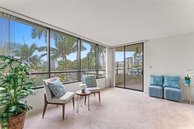 1525 Wilder Ave Unit 401, Honolulu, HI 96822 - sunroom with carpet floors, a textured ceiling, and a view of city