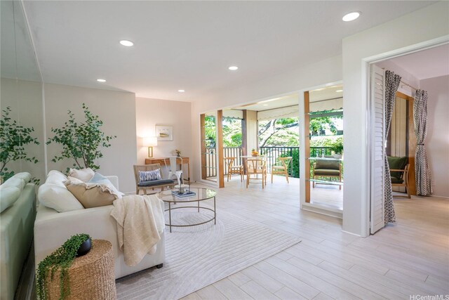 3721 Kanaina Ave Unit 201, Honolulu, HI 96815 - living room featuring recessed lighting and light wood-style flooring