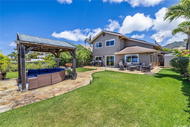 92-6024 Kohi St, Kapolei, HI 96707 - back of house featuring an outdoor hangout area, a gazebo, a patio area, and a lawn