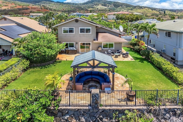 92-6024 Kohi St, Kapolei, HI 96707 - back of house featuring a gazebo, a mountain view, and a fenced backyard
