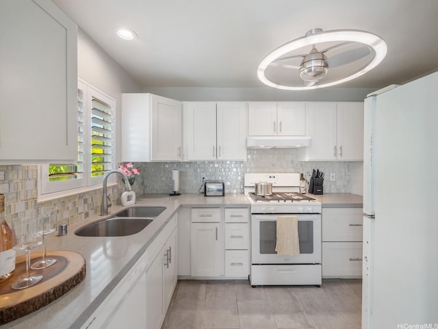 91-1058 Kekuilani Loop Unit 1508, Kapolei, HI 96707 - kitchen with white appliances, white cabinets, light countertops, and tasteful backsplash