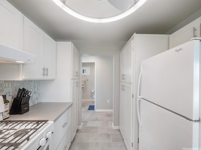 91-1058 Kekuilani Loop Unit 1508, Kapolei, HI 96707 - kitchen featuring white appliances, decorative backsplash, white cabinets, light countertops, and light tile patterned floors