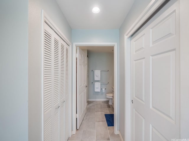 91-1058 Kekuilani Loop Unit 1508, Kapolei, HI 96707 - corridor with light tile patterned floors and baseboards