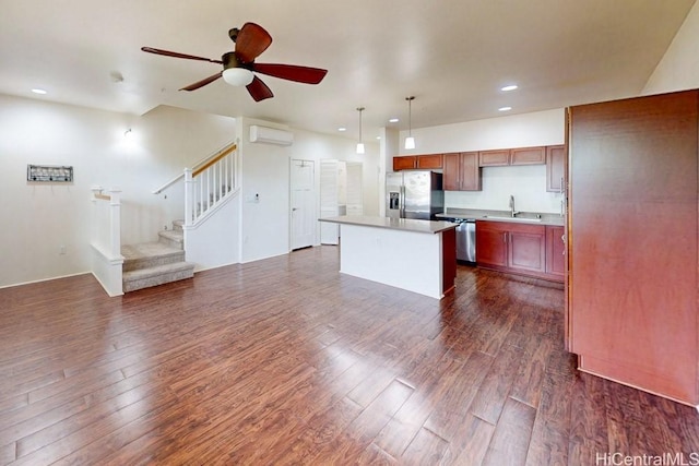 801 Kakala St Unit 1904, Kapolei, HI 96707 - kitchen with appliances with stainless steel finishes, open floor plan, dark wood finished floors, recessed lighting, and a ceiling fan