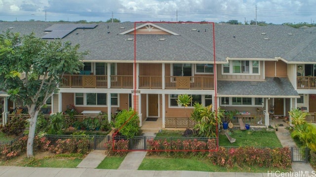 801 Kakala St Unit 1904, Kapolei, HI 96707 - view of front of home featuring a shingled roof, a gate, and a fenced front yard