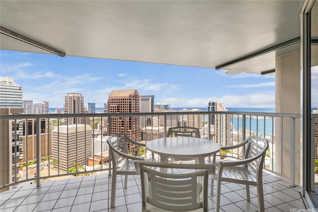 1212 Nuuanu Ave Unit 3402, Honolulu, HI 96817 - balcony featuring a view of city, a water view, and outdoor dining space