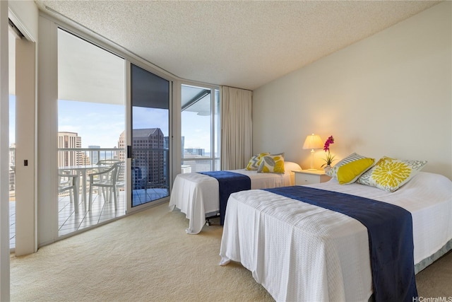 1212 Nuuanu Ave Unit 3402, Honolulu, HI 96817 - carpeted bedroom with access to exterior, expansive windows, and a textured ceiling