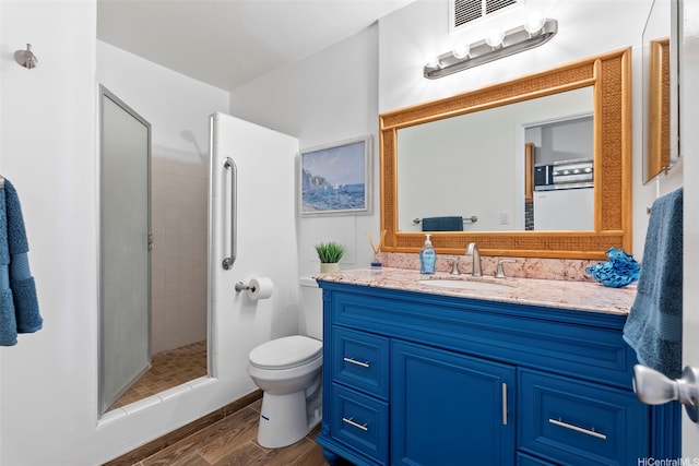 1720 Ala Moana Blvd Unit 1101B, Honolulu, HI 96815 - full bathroom with wood finished floors, vanity, and a shower stall