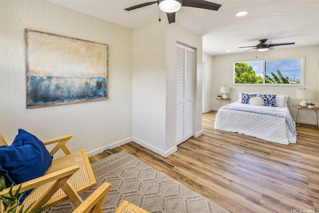 54-290 Kawaipuna Pl, Hauula, HI 96717 - bedroom featuring wood finished floors, a closet, a ceiling fan, and recessed lighting
