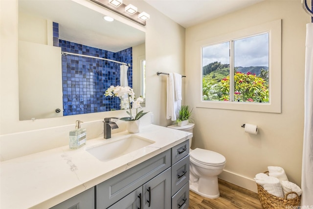 54-290 Kawaipuna Pl, Hauula, HI 96717 - bathroom with vanity, a tile shower, and wood finished floors