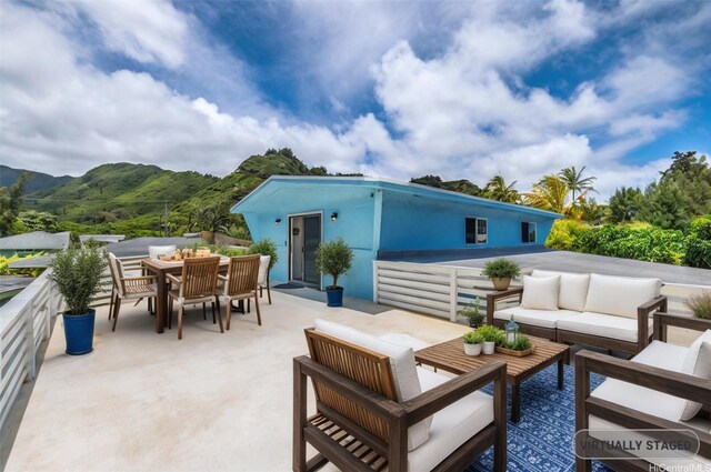 54-290 Kawaipuna Pl, Hauula, HI 96717 - view of patio / terrace with an outdoor hangout area, outdoor dining space, and a mountain view