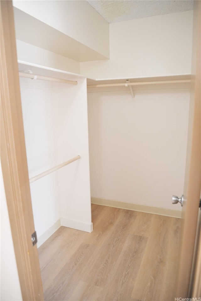 98-1038 Moanalua Rd Unit 7-1706, Aiea, HI 96701 - spacious closet with wood finished floors