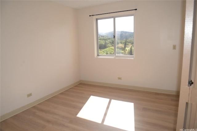 98-1038 Moanalua Rd Unit 7-1706, Aiea, HI 96701 - spare room featuring light wood-style flooring