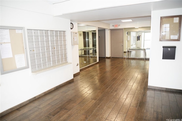 98-1038 Moanalua Rd Unit 7-1706, Aiea, HI 96701 - spare room with mail area and hardwood / wood-style flooring
