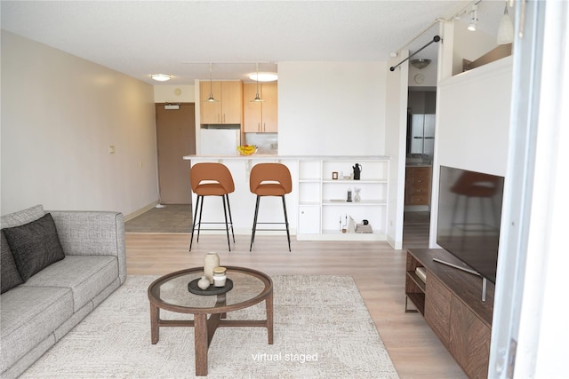 98-1038 Moanalua Rd Unit 7-1706, Aiea, HI 96701 - living room featuring light wood-style flooring