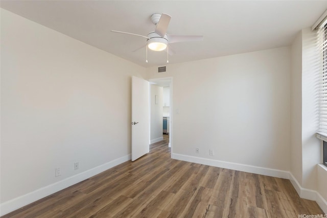 1910 Ala Moana Blvd Unit 7D, Honolulu, HI 96815 - unfurnished room featuring wood finished floors and ceiling fan