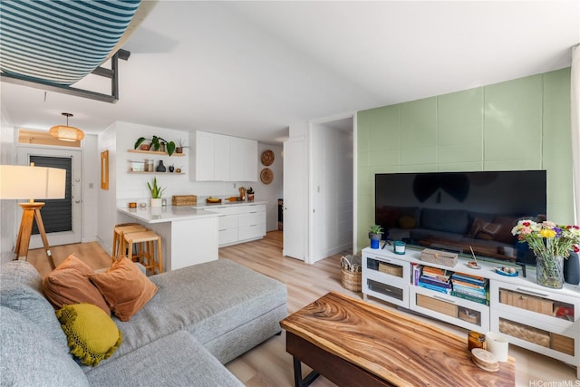 920 Kaheka St Unit 25, Honolulu, HI 96814 - living room featuring light wood-style flooring