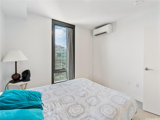 987 Queen St Unit 4112, Honolulu, HI 96814 - carpeted bedroom with a wall mounted air conditioner and baseboards