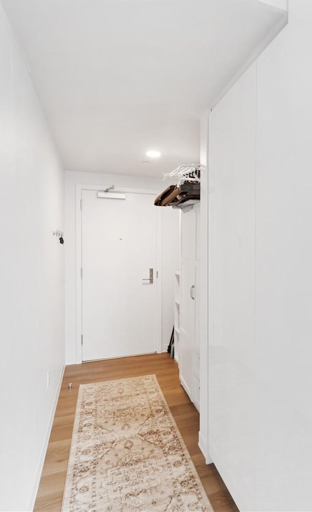 987 Queen St Unit 4112, Honolulu, HI 96814 - laundry room with light wood finished floors
