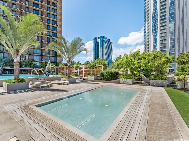 987 Queen St Unit 4112, Honolulu, HI 96814 - community pool featuring a view of city