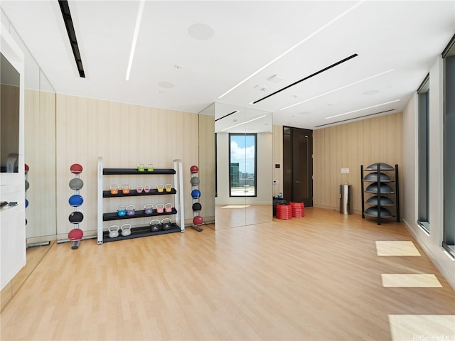 987 Queen St Unit 4112, Honolulu, HI 96814 - workout area with light wood-style floors and wooden walls