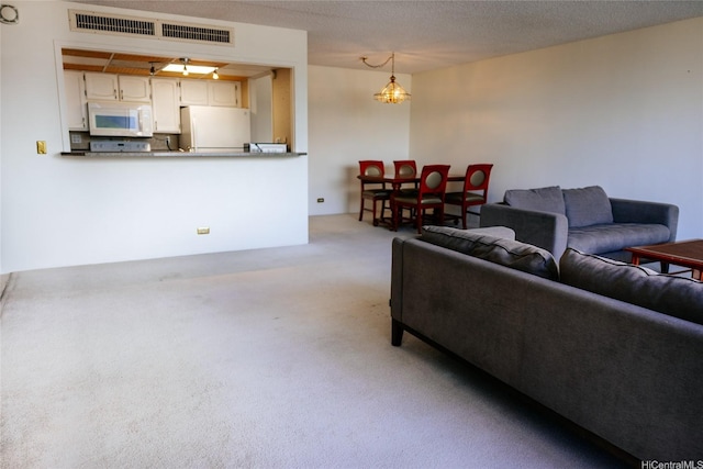 2240 Kuhio Ave Unit 3801, Honolulu, HI 96815 - living room with light colored carpet