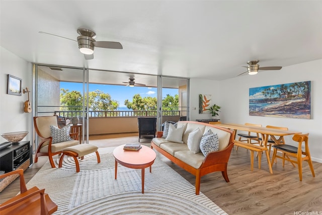 46-109 Konohiki St Unit 3934, Kaneohe, HI 96744 - living room with ceiling fan, wood finished floors, and floor to ceiling windows