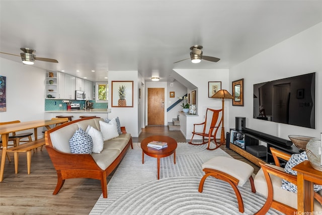 46-109 Konohiki St Unit 3934, Kaneohe, HI 96744 - living room with a ceiling fan, stairway, wood finished floors, and recessed lighting