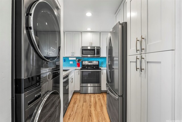 46-109 Konohiki St Unit 3934, Kaneohe, HI 96744 - kitchen featuring stainless steel appliances, white cabinets, backsplash, light wood-style flooring, and recessed lighting
