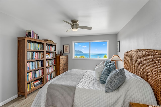 46-109 Konohiki St Unit 3934, Kaneohe, HI 96744 - bedroom with light wood finished floors and ceiling fan