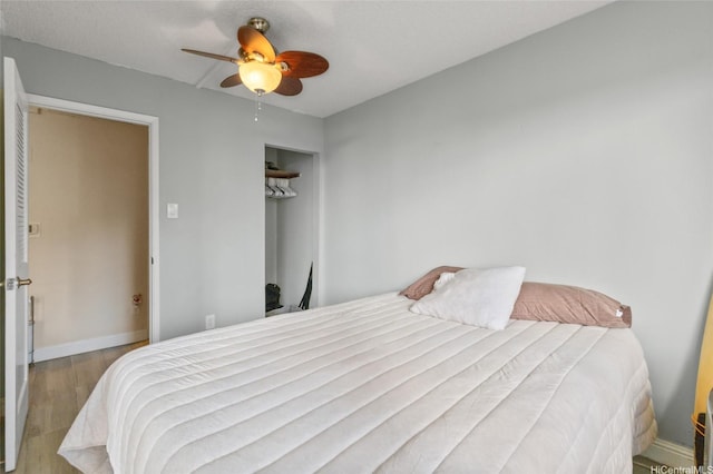 1684 Ala Moana Blvd Unit 251, Honolulu, HI 96815 - bedroom with wood finished floors, ceiling fan, and a closet