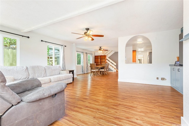94-170 Apele Pl, Mililani, HI 96789 - living room with light wood-type flooring, a ceiling fan, and arched walkways