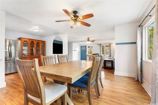 94-170 Apele Pl, Mililani, HI 96789 - dining room featuring a ceiling fan, healthy amount of natural light, and light wood-style flooring