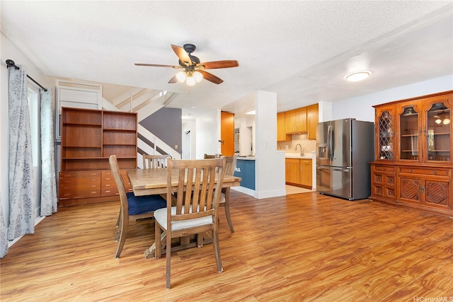 94-170 Apele Pl, Mililani, HI 96789 - dining area featuring light wood-type flooring, a ceiling fan, and a textured ceiling