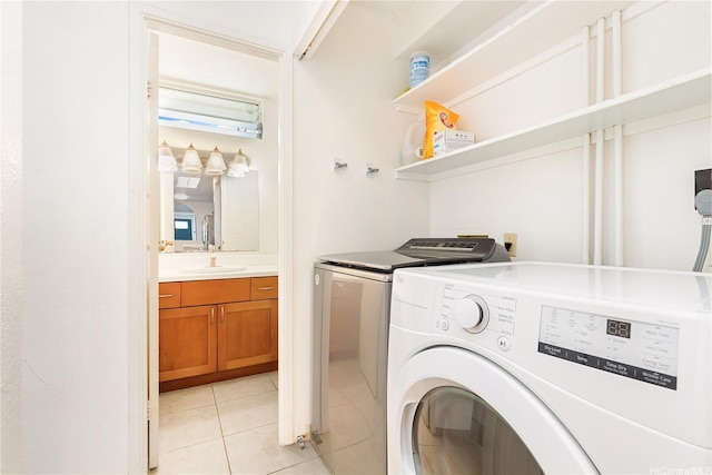 94-170 Apele Pl, Mililani, HI 96789 - laundry area featuring washer and dryer and light tile patterned floors