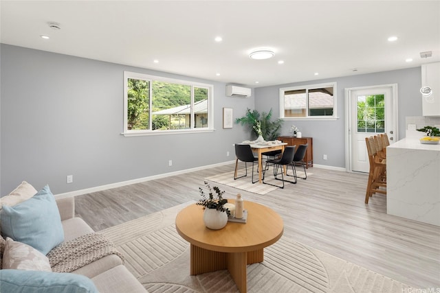 1989 9th Ave, Honolulu, HI 96816 - living room with an AC wall unit, light wood-style flooring, and recessed lighting