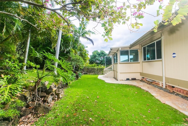 1373 Kaeleku St, Honolulu, HI 96825 - view of green lawn featuring a sunroom