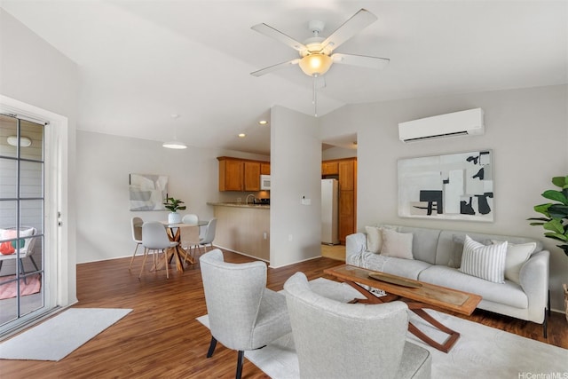 92-1487-A Aliinui Dr Unit 27A, Kapolei, HI 96707 - living room with an AC wall unit, vaulted ceiling, wood finished floors, ceiling fan, and recessed lighting