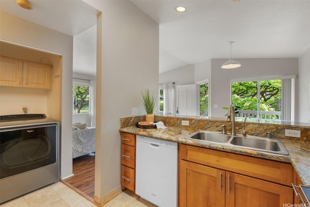 92-1487-A Aliinui Dr Unit 27A, Kapolei, HI 96707 - kitchen featuring dishwasher, washer / clothes dryer, vaulted ceiling, light tile patterned floors, and light stone counters