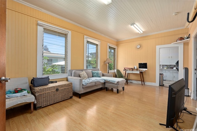 1242 16th Ave, Honolulu, HI 96816 - living room featuring crown molding, light wood finished floors, and wood walls