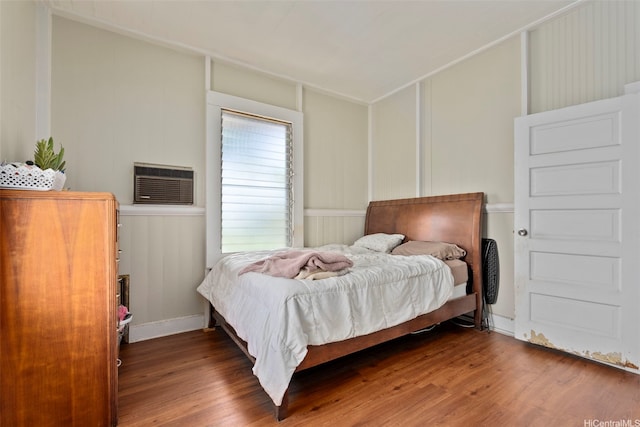 1242 16th Ave, Honolulu, HI 96816 - bedroom with wood finished floors and a wall unit AC