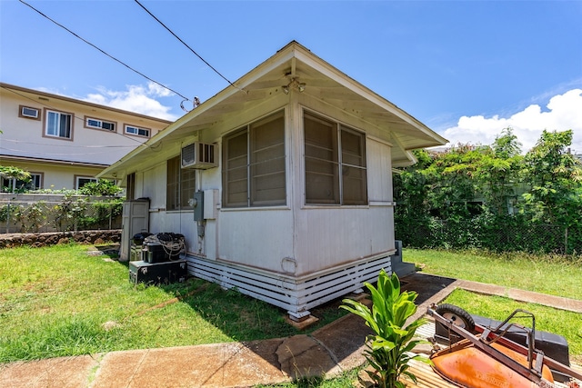 1242 16th Ave, Honolulu, HI 96816 - view of side of property with a wall unit AC