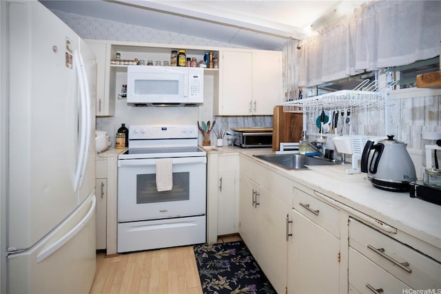 45-234 Mahalani Cir, Kaneohe, HI 96744 - kitchen with white appliances, open shelves, light wood-type flooring, white cabinetry, and vaulted ceiling