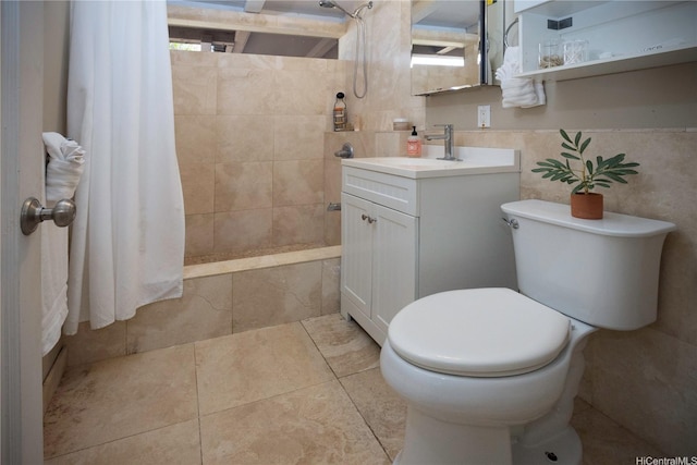 45-234 Mahalani Cir, Kaneohe, HI 96744 - bathroom featuring tiled shower, vanity, tile patterned floors, and tile walls