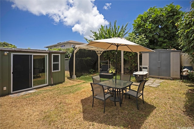 45-234 Mahalani Cir, Kaneohe, HI 96744 - view of yard with a shed and outdoor dining space