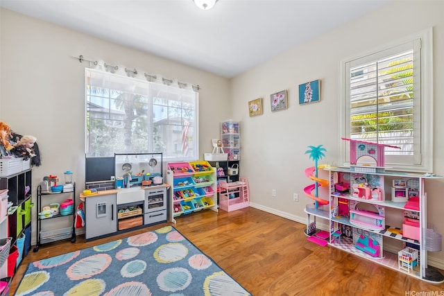 91-1030 Kai Uhu St, Ewa Beach, HI 96706 - recreation room with plenty of natural light and wood finished floors