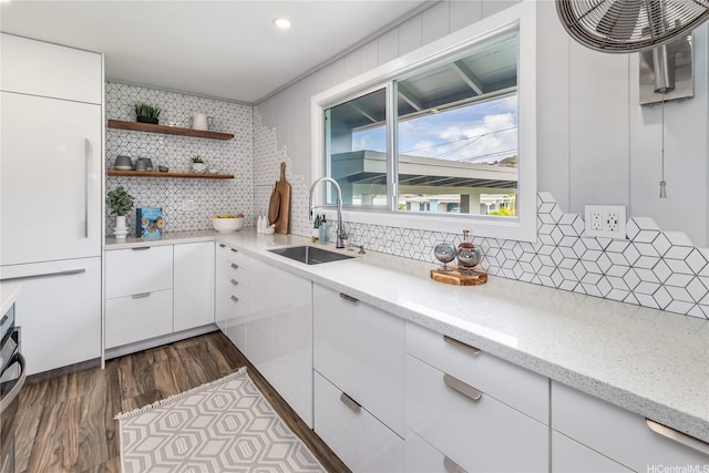 1384 Nanawale Pl, Kailua, HI 96734 - kitchen with backsplash, open shelves, white cabinets, paneled refrigerator, and light stone counters